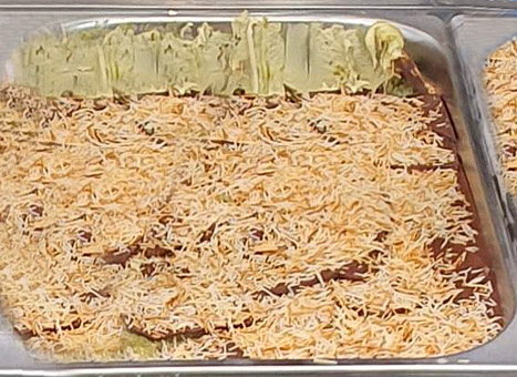 Eisidee Dubai. Pistazieneiscrem mit Schokoüberzug und Engelshaar