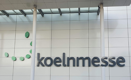 Kölnmesse Logo. Für Anuga und ISM, Lebensmittelmesse, Süßwarenmesse in Köln